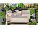 Aerial view highlighting the backyard with a patio, manicured garden, and outdoor living at 10741 E Palladium Dr, Mesa, AZ 85212