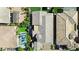 Aerial view showcasing the outdoor living space, landscaping, and manicured lawn at 10741 E Palladium Dr, Mesa, AZ 85212