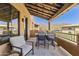 Cozy outdoor patio area featuring comfortable seating and views of the surrounding landscape at 13450 E Via Linda -- # 2041, Scottsdale, AZ 85259
