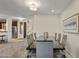 Bright dining room featuring a contemporary table set, neutral walls, and elegant lighting, perfect for Gathering meals at 13450 E Via Linda -- # 2041, Scottsdale, AZ 85259