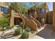 Exterior entrance featuring lush landscaping and inviting staircases at 13450 E Via Linda -- # 2041, Scottsdale, AZ 85259