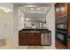 Contemporary kitchen showcasing stainless steel appliances and view to living area at 13450 E Via Linda -- # 2041, Scottsdale, AZ 85259