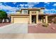 Charming two-story stucco home featuring a two-car garage and drought tolerant landscaping at 16333 N 181St Ave, Surprise, AZ 85388