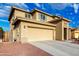 Attractive stucco home boasting a two-car garage and drought tolerant landscaping at 16333 N 181St Ave, Surprise, AZ 85388