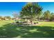Charming gazebo in a park-like setting, perfect for relaxation and enjoying the outdoors at 16333 N 181St Ave, Surprise, AZ 85388