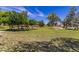 Scenic park with lush green grass, mature trees, a gazebo, and walking path, creating a peaceful outdoor space at 16333 N 181St Ave, Surprise, AZ 85388