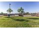 Community skate park featuring ramps, benches, and open green space, ideal for outdoor recreation and gatherings at 16333 N 181St Ave, Surprise, AZ 85388