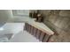 View of a carpeted staircase with a wooden handrail being built, complemented by tile flooring and natural light at 16789 W Moreland St, Goodyear, AZ 85338