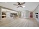 Spacious open floor plan with hardwood floors and modern lighting at 28770 N 69Th Ln, Peoria, AZ 85383