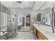 Elegant primary bathroom with a large walk-in shower, soaking tub, and dual sink vanity at 6264 E Omega St, Mesa, AZ 85215