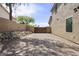 Long driveway leading to a gated area, showcasing privacy and security at 6264 E Omega St, Mesa, AZ 85215
