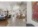 Inviting foyer features a staircase, and ample natural light and flows nicely into the formal dining area at 6264 E Omega St, Mesa, AZ 85215