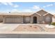 Charming single-story home featuring a low maintenance yard, covered entryway, and attached two-car garage at 6942 S Championship Dr, Chandler, AZ 85249