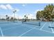 Tennis court at daytime with plenty of sunshine at 6942 S Championship Dr, Chandler, AZ 85249