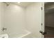 Bathroom features a tiled tub and shower with modern fixtures and hardware at 8425 E Welsh Trl, Scottsdale, AZ 85258