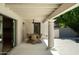 The patio has an outdoor dining set with a white ceiling and tiled floor at 8425 E Welsh Trl, Scottsdale, AZ 85258
