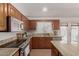 Updated kitchen with granite countertops, stainless steel appliances at 1033 E Mountain Vista Dr, Phoenix, AZ 85048