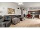 Open-concept layout showcasing a living room that flows into a dining area and kitchen at 1033 E Mountain Vista Dr, Phoenix, AZ 85048
