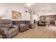 Spacious living room features an open layout, recessed lighting, and wood-look flooring at 1033 E Mountain Vista Dr, Phoenix, AZ 85048