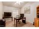 This office is complete with neutral walls, carpet, and bright, natural lighting at 1033 E Mountain Vista Dr, Phoenix, AZ 85048