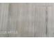 Close up of light colored flooring, showcasing its texture and pattern at 10407 W Reade Ave, Glendale, AZ 85307