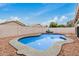 Backyard pool with clear blue water, landscaping, and lounge chairs for relaxation at 10407 W Reade Ave, Glendale, AZ 85307
