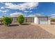 Charming one-story home with well-maintained landscaping and a driveway at 1053 S 96Th St, Mesa, AZ 85208