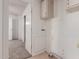 A laundry room with cabinet, hookups, and white walls at 1053 S 96Th St, Mesa, AZ 85208