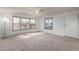 Bright living room with carpet floors and an abundance of natural light at 1053 S 96Th St, Mesa, AZ 85208
