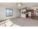 Inviting living area connected to the kitchen, featuring ample natural light at 1053 S 96Th St, Mesa, AZ 85208