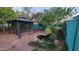 Lush backyard featuring a gazebo and pond, perfect for relaxation at 11265 E Contessa St, Mesa, AZ 85207