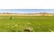Expansive driving range offers stunning views of the surrounding landscape at 12335 W Rosewood Ln, Peoria, AZ 85383