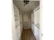 Walk-in closet with custom shelving and ample storage space for clothing and accessories at 1414 N Palmsprings Dr, Gilbert, AZ 85234