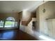 A view of the foyer and living space showcasing beautiful wood floors, vaulted ceiling, and staircase at 1414 N Palmsprings Dr, Gilbert, AZ 85234