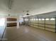 Spacious garage with ample storage, cabinets, and room for multiple vehicles at 1414 N Palmsprings Dr, Gilbert, AZ 85234