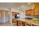 Modern kitchen featuring granite countertops, island seating, and stainless steel appliances at 1414 N Palmsprings Dr, Gilbert, AZ 85234
