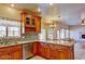 Modern kitchen featuring granite countertops, stainless steel appliances, and ample cabinet space at 1414 N Palmsprings Dr, Gilbert, AZ 85234