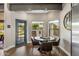 Cozy breakfast nook featuring a glass table, seating for four, and a view of the outdoor barbecue area at 15645 S 17Th St, Phoenix, AZ 85048