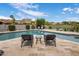Inviting pool area featuring comfortable lounge chairs and scenic views of the surrounding landscape and mountains at 15645 S 17Th St, Phoenix, AZ 85048