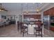 Modern kitchen featuring a granite island, stainless steel appliances, and breakfast bar seating at 16445 W Berkeley Rd, Goodyear, AZ 85395
