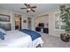 A spacious main bedroom includes an attached bathroom and sitting area at 16445 W Berkeley Rd, Goodyear, AZ 85395