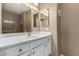 Bathroom with white vanity, sink, and warm neutral-toned walls and finishes at 16626 E Westby Dr # 108, Fountain Hills, AZ 85268