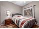Bedroom with wood-look floors, neutral walls, and a comfortable-looking bed at 16626 E Westby Dr # 108, Fountain Hills, AZ 85268