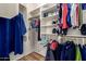 Walk-in closet with built-in shelving and ample storage space for clothes and accessories at 16626 E Westby Dr # 108, Fountain Hills, AZ 85268
