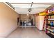 Organized garage with washer and dryer, storage shelves, and visible ceiling mechanics at 16626 E Westby Dr # 108, Fountain Hills, AZ 85268