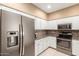 Well-appointed kitchen with stainless steel appliances and ample cabinet space at 16626 E Westby Dr # 108, Fountain Hills, AZ 85268