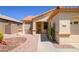 Inviting single-story home showcasing desert landscaping and a decorative walkway at 17640 W Babbitt Dr, Surprise, AZ 85374