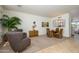 Open-concept layout connecting the living and dining areas with natural light at 17640 W Babbitt Dr, Surprise, AZ 85374