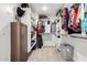 Walk-in closet with ample shelving and hanging space for storage at 17652 W Straight Arrow Ln, Surprise, AZ 85387