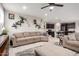 Comfortable living room with open access to the kitchen, perfect for gatherings at 17652 W Straight Arrow Ln, Surprise, AZ 85387